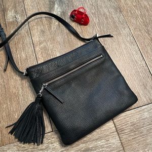 Black pebbled leather multi-pocket crossbody bag with detachable tassel …